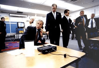 President George W. Bush is briefed on the attacks in Sarasota, Florida