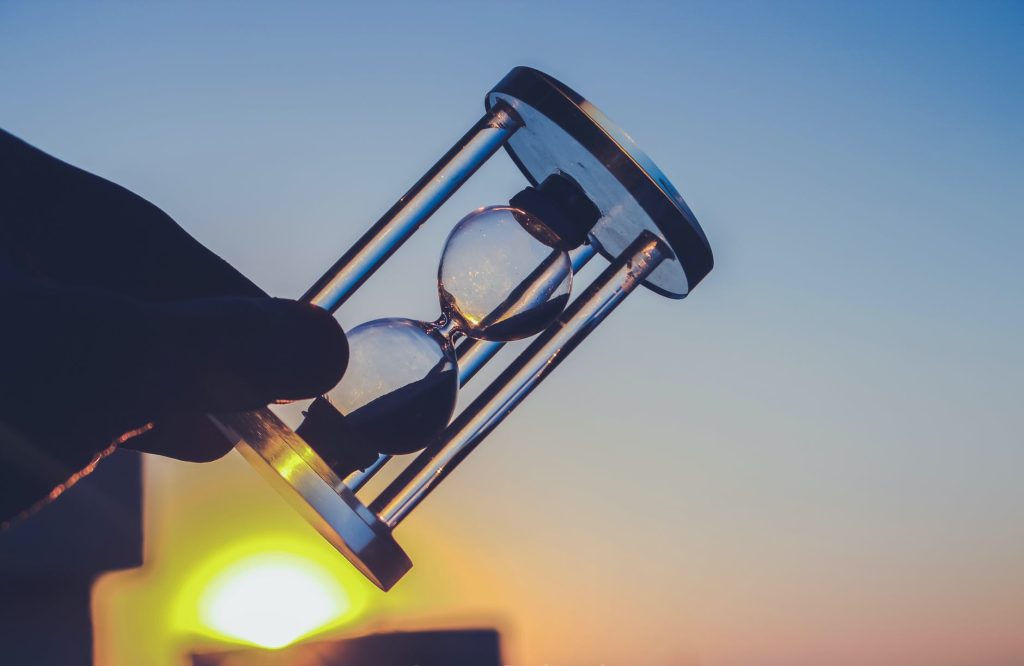 A rotated hourglass.